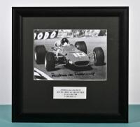 deADAMICH: A black and white image of Andrea de Adamich racing a Ferrari 312 at the South African Grand Prix Kyalami 1968. Andrea de Adamich signature - 2