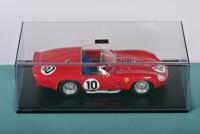 TR 61: A 1:24 scale Red Line models Ferrari TR 61 as raced to victory at Le Mans 1961. With box