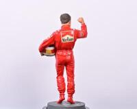MICHAEL SCHUMACHER: A 1:9 scale limited edition (2433/5000) cold cast porcelain resin figure of Michael Schumacher sculpted by Paul Szeiler for Endurance Ltd, on wooden base with engraved plaque, NIB and accompanied by a COA from The Art of Sport, 22cm hi - 5