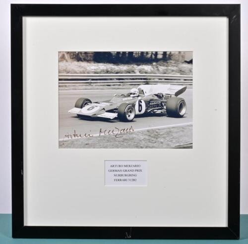 MERZARIO: A black and white picture of Arturo Merzario racing a Ferrari 312B2 at German Grand Prix, Nurburgring. Arturo Merzario signature