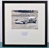MERZARIO: A black and white picture of Arturo Merzario racing a Ferrari 312B2 at German Grand Prix, Nurburgring. Arturo Merzario signature