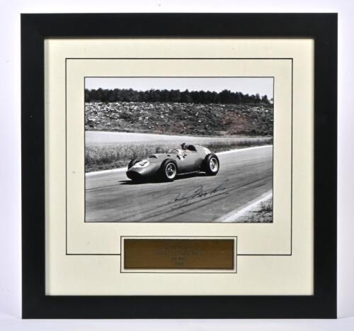 BROOKS: A black and white picture of Tony Brooks racing a Ferrari Dino 246 at the French Grand Reims 1959. Tony Brooks signature