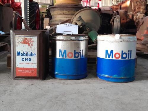 MOBIL: Three 4-gallon Mobil Oil tins, some with oil