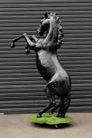 PRANCING HORSE: A life size black fibreglass prancing horse,&nbsp; - 6