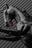 PRANCING HORSE: A life size black fibreglass prancing horse,&nbsp; - 7