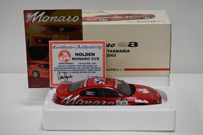 MONARO: A 1:18 scale Autoart Holden Monaro CV8 as raced by Peter Brock/James Brock in Targa Tasmania 2003, #05, roof signed by Peter Brock and trunk signed by James Brock, with a copy of the COA numbered 2752/6000, in fitted box, faded box (SALEROOM NOTICE)