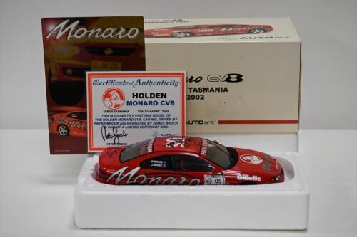 MONARO: A 1:18 scale Autoart Holden Monaro CV8 as raced by Peter Brock/James Brock in Targa Tasmania 2003, #05, roof signed by Peter Brock and trunk signed by James Brock, with a copy of the COA numbered 2752/6000, in fitted box, faded box (SALEROOM NOTIC