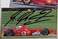 SCHUMACHER: A collection of Michael Schumacher and Ferrari related items. Michael Schumacher signatures - 3