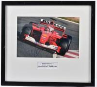 BARRICHELLO&nbsp;FERRARI: A colour picture of a Ferrari F-2001 as raced by Rubens Barrichello at the SPANISH GRAND PRIX, BARCELONA 2001, picture signed by Rubens Barrichello
