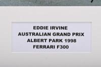 IRVINE: A colour picture of a Ferrari F300 as raced by Eddie Irvine at the AUSTRALIAN GRAND PRIX ALBERT PARK 1998. Picture signed by Eddie Irvine - 3