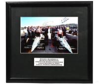 MANSELL/ANDRETTI: A colour picture of Nigel Mansell and Mario Andretti at the Indycar World Series, Laguna Seca 1994. Nigel Mansell & Mario Andretti signatures