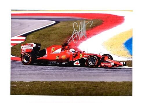 VETTEL: A colour picture of Sebastian Vettel racing a Ferrari SF15-T during the 2015 Formula 1 season. Picture signed by Sebastian Vettel