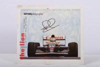 MANSELL: A colour picture by COPYRIGHT SUTTON photographic - 'the lion' - of Nigel Mansell racing a Williams FW14B. Picture signed by Nigel Mansell