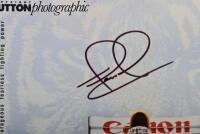 MANSELL: A colour picture by COPYRIGHT SUTTON photographic - 'the lion' - of Nigel Mansell racing a Williams FW14B. Picture signed by Nigel Mansell - 2