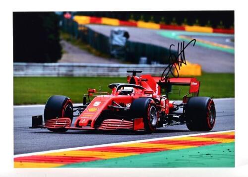 VETTEL: A colour picture of Sebastian Vettel racing a Ferrari SF1000. Sebastian Vettel signature