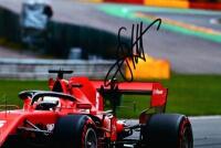 VETTEL: A colour picture of Sebastian Vettel racing a Ferrari SF1000. Sebastian Vettel signature - 2