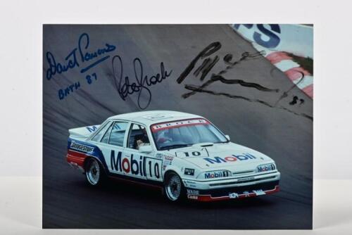 BATHURST 1987: An original colour picture by Ian Smith of Peter Brock, David Parsons, Peter McLeod racing a VL Commodore SS Group A to victory at the 1987 James Hardie 1000. Picture with driver signatures