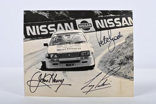 BATHURST 1983: An original Ian Smith black and white image of Peter Brock, John Harvey, Larry Perkins racing a Holden VH Commodore SS to victory at the 1983 James Hardie 1000. Brock, Harvey, Perkins signatures