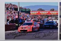 BATHURST 2012: Two colour pictures from Bathurst 2012 depicting winners Paul Dumbrell and Jamie Whincup. Each picture signed by Dumbrell & Whincup - 2