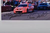 BATHURST 2012: Two colour pictures from Bathurst 2012 depicting winners Paul Dumbrell and Jamie Whincup. Each picture signed by Dumbrell & Whincup - 3
