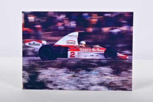 MASS: A colour picture of Jochen Mass racing a McLaren M23. Jochen Mass signature