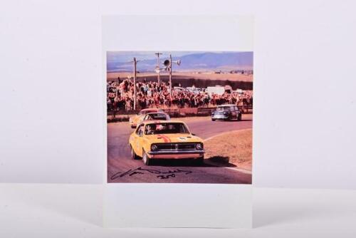 BEECHEY: A colour picture of Norm Beechey racing a HT Holden Monaro GTS 350 at Bathurst 1970. Norm Beechey signature