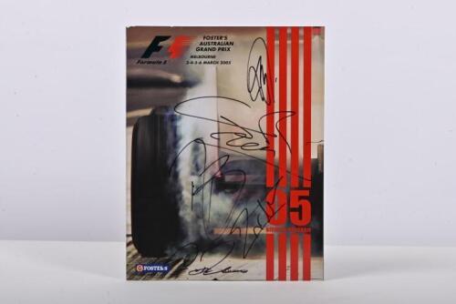 FORMULA 1: A March 2005 'FOSTER'S AUSTRALIAN GRAND PRIX' Official Program. Front cover signed by race winner Giancarlo Fisichella and others