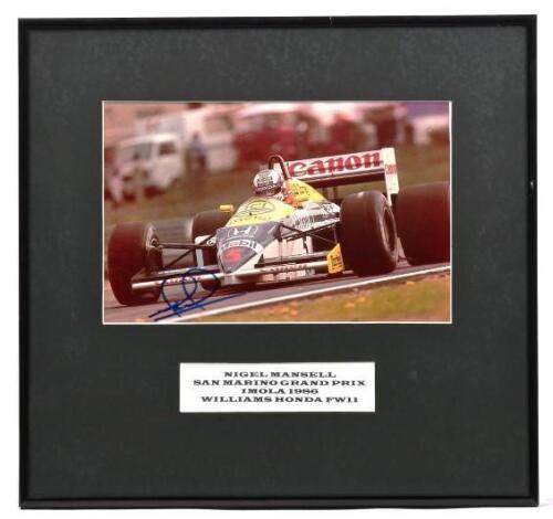 MANSELL: A colour picture of Nigel Mansell racing a Williams Honda FW11 at SAN MARINO GRAND PRIX IMOLA 1986. Picture signed by Nigel Mansell