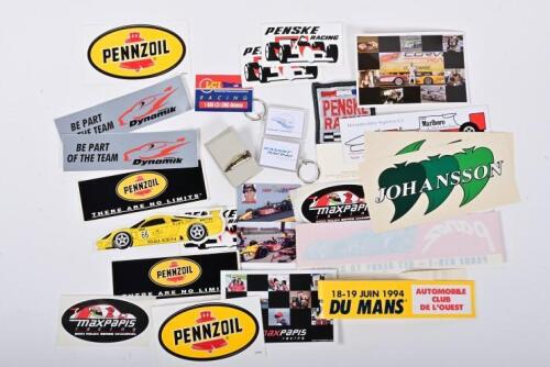 RACING STICKERS: A quantity of racing stickers and badges predominantly from American racing. 'PENSKE RACING' stickers and cloth badge