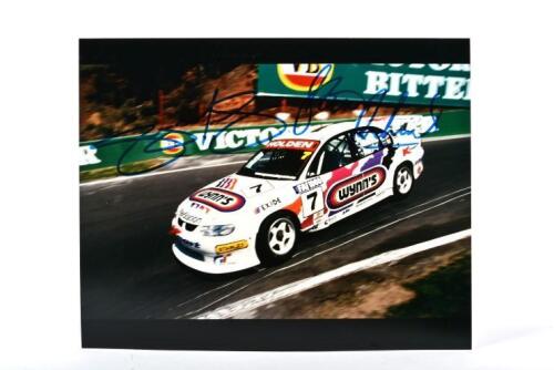 BATHURST 1999: A colour picture of Greg Murphy and Steven Richards racing to victory in the Wynn's Holden VT Commodore at Bathurst 1999. Murphy & Richards signatures