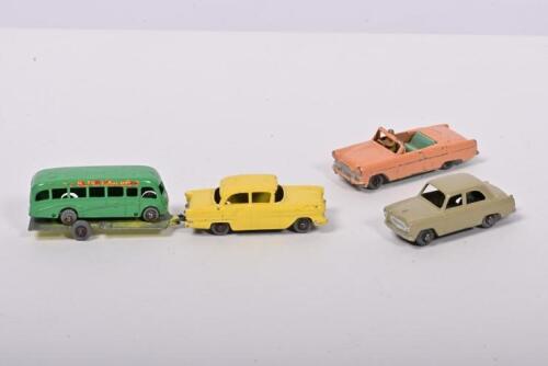MATCHBOX: A collection of four Matchbox Regular wheel models. Ford Prefect, Ford Zodiac Convertible, Vauxhall Victor, Bedford Duple Luxury Coach models. Circa 1950's