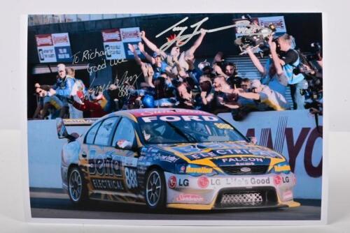 BATHURST 2006: A colour picture of Craig Lowndes and Jamie Whincup racing to victory at Bathurst 2006 in the Betta Electrical BA Ford Falcon. Lowndes & Whincup signatures