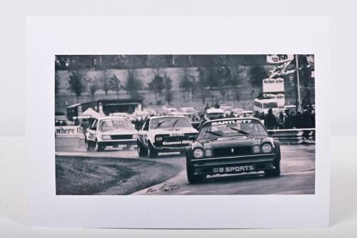 BARTLETT/MORRIS/BROCK: A black and white picture from Symmons Plains of Kevin Bartlett's Chevrolet Z28 Camaro, Bob Morris Holden Torana and Peter Brock Holden Commodore, picture signed by Kevin Bartlett. Circa 1980's