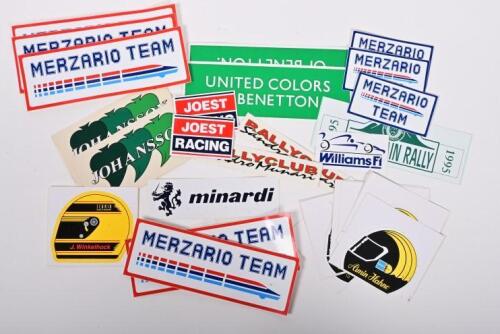 PERIOD RACING STICKERS: An interesting collection of motor racing adhesives. 'Amin Hahne', 'JOEST RACING', 'MERZARIO TEAM', 'UNITED COLORS OF BENETTON' stickers