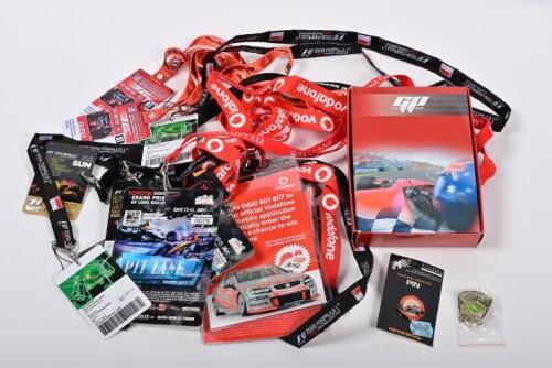 MOTOR RACING: A collection of motor racing lanyards, tickets and pins for various motor racing events. Macau Grand Prix, Melbourne Grand Prix, Singapore Grand Prix, TOYOTA GRAND PRIX OF LONG BEACH items