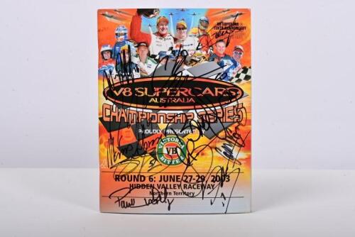 V8 SUPERCARS: A 2003 'V8 SUPERCARS AUSTRALIA CHAMPIONSHIP SERIES - Round 6: June 27-29, 2003, HIDDEN VALLEY RACEWAY, Northern Territory' Official Program, front cover signed by multiple V8 Supercar drivers including Jason Bargwanna, Brad Jones, Glenn Seto
