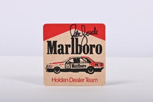 BROCK: A Marlboro Holden Dealer Team cardboard coaster. Coaster signed by Peter Brock