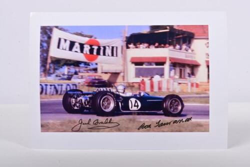 BRABHAM/TAURANAC: A colour picture of Sir Jack Brabham racing a Brabham BT 19 at Reims 1966. picture signed by Sir Jack Brabham and Ron Tauranac