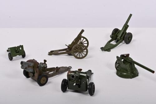 CANNONS: A collection of six military cannons by various toy manufacturers. Britains, Dinky Toys cannons