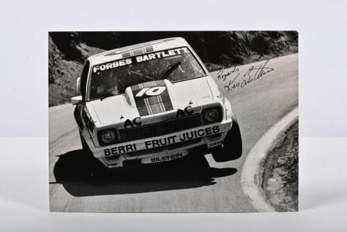 BARTLETT: A black and white picture of Kevin Bartlett racing a Holden Torana L34 A9X at Mt.Panorama, Bathurst. Kevin Bartlett signature