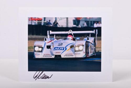 AUDI: A colour picture of Marco Werner racing for ADT Champion RACING at the 2004 Le Mans. Marco Werner signature