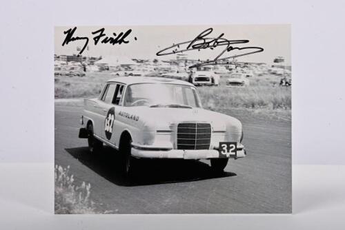 FIRTH/JANE: A black and white image of Harry Firth and Bob Jane racing a Mercedes-Benz 220SE to victory at the 1961 Armstrong 500. Firth & Jane signatures