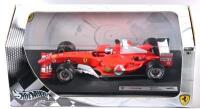FERRARI: A 1:18 scale Hot Wheels Ferrari F2004 Formula 1 (B6201) race car as driven by Rubens Barrichello, racing number '2' with associated sponsorship decals; with original display box, model on display board. - 5