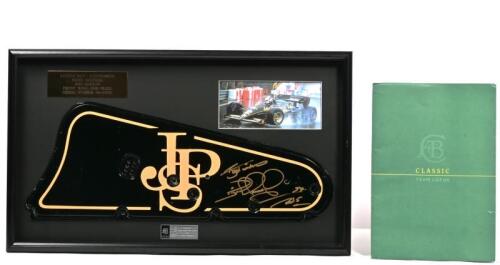 MANSELL/JPS: A superb and interesting Classic Team Lotus Front Wing End Plate (Serial Number 94-2009) from Nigel Mansell's Mansell's Lotus 94T as raced in the 1983 Grand Prix season. End plate signed by Nigel Mansell