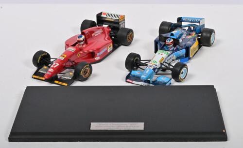 FORMULA 1: Two 1:18 scale Paul's Model Art Formula 1 models. 1994 Ferrari 412t1 as raced by Jean Alesi & Limited Edition 1995 Benetton B195 as raced by Michael Schumacher. Schumacher model with display board