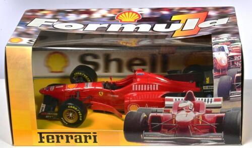 FERRARI: A 1:20 scale Maisto Ferrari F310 as raced by Michael Schumacher
