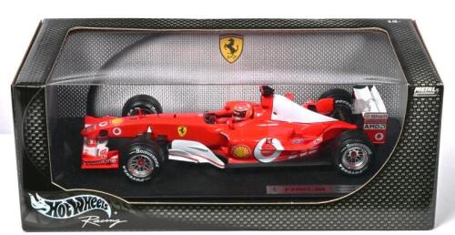FERRARI: A 1:18 scale Hotwheels Racing Ferrari F2003-GA Formula 1 car as raced by Michael Schumacher