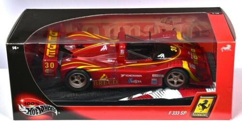 FERRARI: A 1:18 scale Hotwheels Ferrari F333 SP