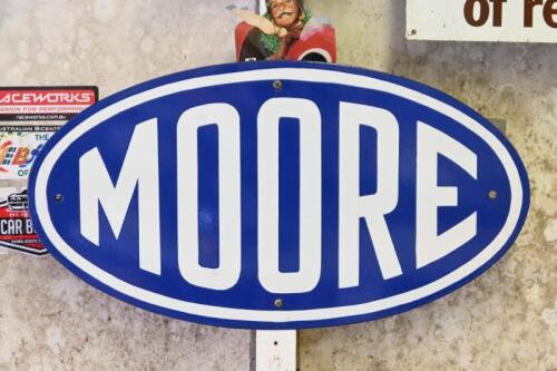 MOORE: An original Malcolm Moore Ltd&nbsp;Melbourne oval enamel sign, 61cm wide