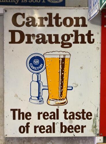 BEER: An original circa 1970s Carlton Draught "The real taste of real bear tin sign, 60cm high x 45cm wide